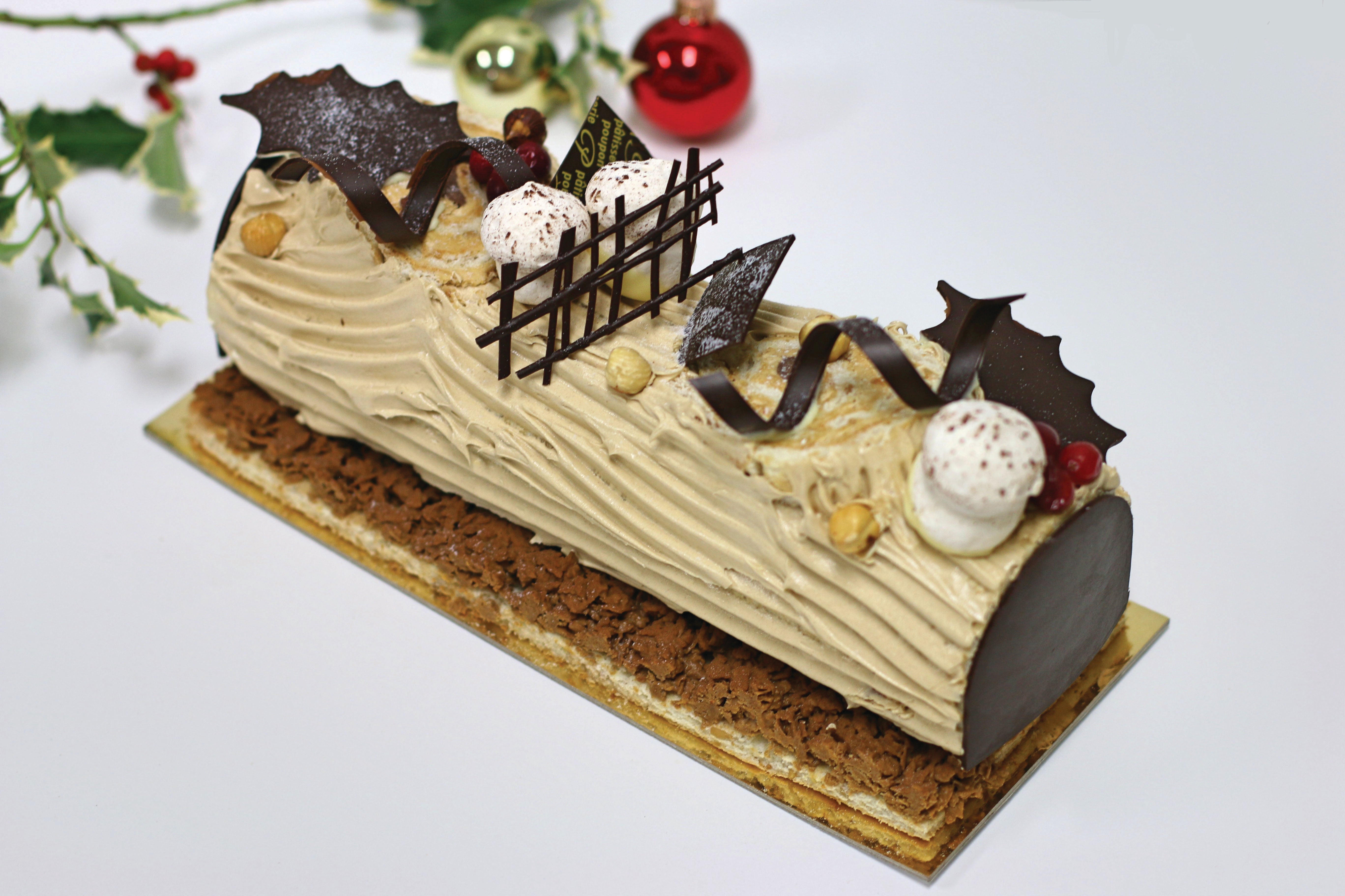 https://patisseriepoupon.com/cdn/shop/products/hazelnut_buche_5472x.jpg?v=1607094799